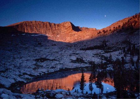 ornamental image of moonlit mountain lake